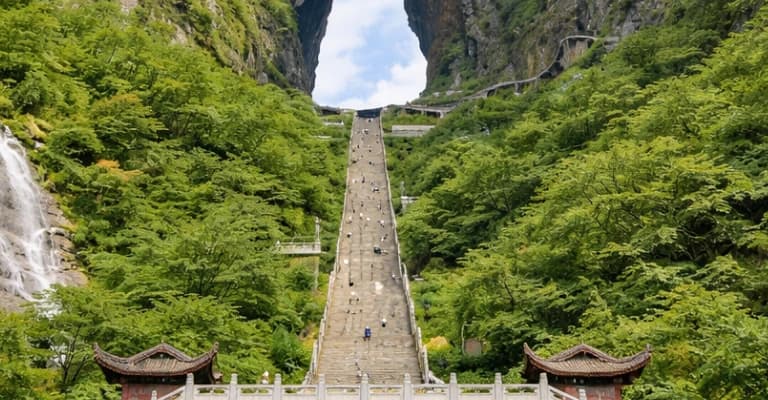 Zhangjiajie National Forest Park with towering sandstone pillars and misty mountain scenery
