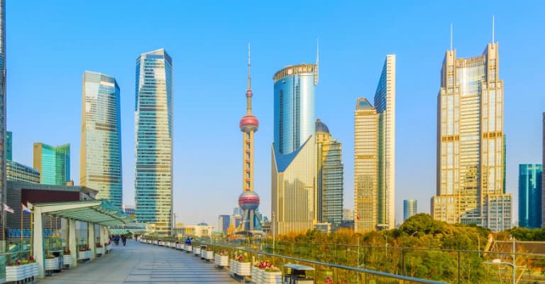 Shanghai futuristic skyline with modern skyscrapers and illuminated Pudong district at night
