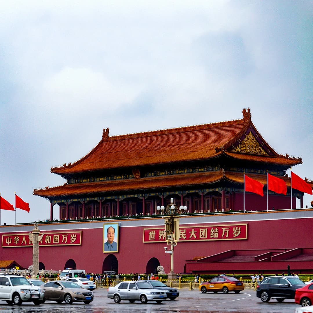 Tiananmen Square Beijing with wide open plaza, historic buildings, and national monuments