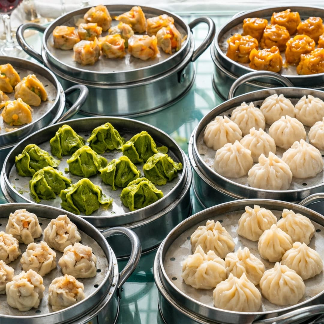 Traditional Chinese dumpling banquet with assorted handmade dumplings served on a dining table