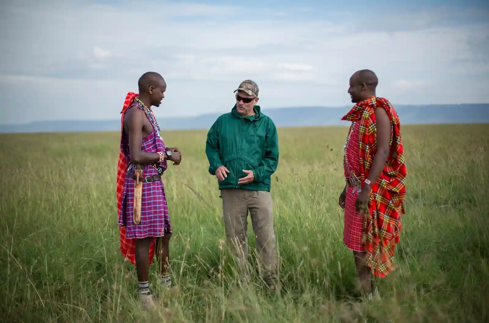 Safari game drive in Kenya with wildlife roaming freely across the savannah plains