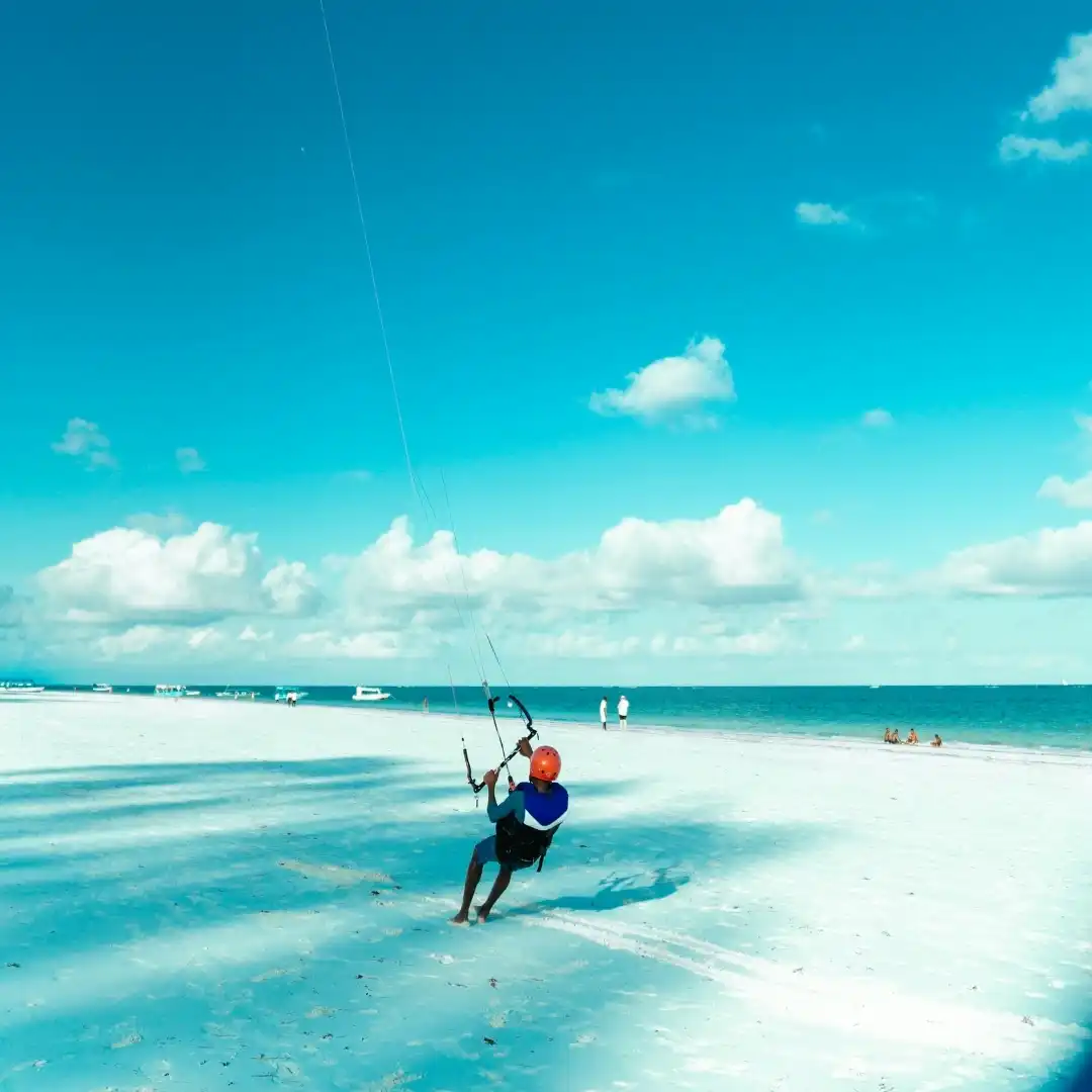 Diani Beach Kenya with white sand, turquoise water, and luxury beach resorts