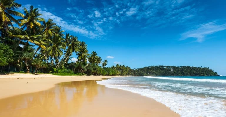 Private car traveling through scenic Sri Lanka roads with greenery and hills