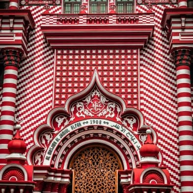 Red Mosque in Colombo featuring striking red-and-white Indo-Islamic architecture