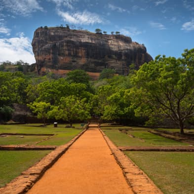 Sigiriya Lion Rock Fortress rising above lush landscapes in central Sri Lanka
