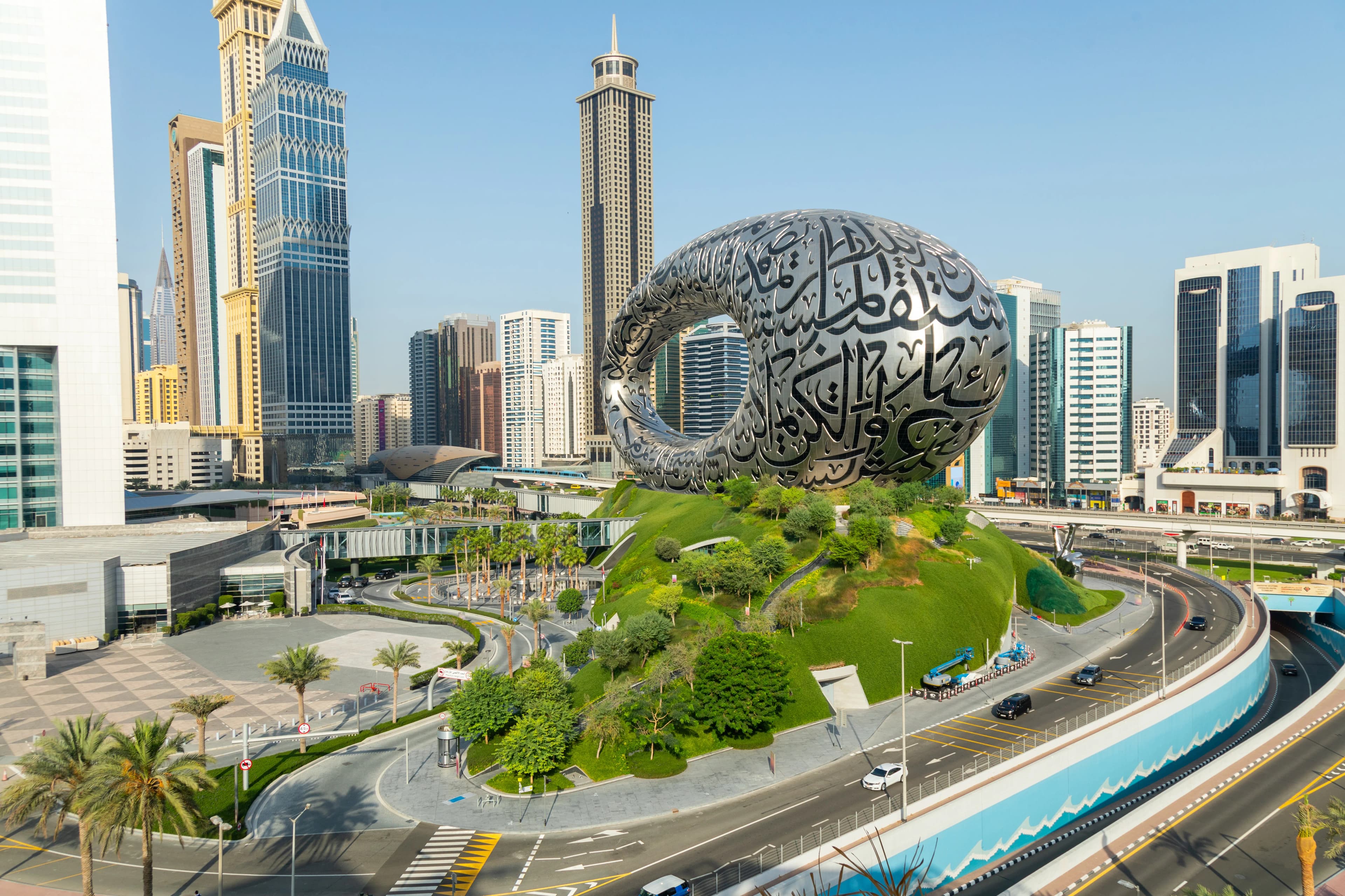 Museum of the Future Dubai with futuristic torus-shaped architecture and Arabic calligraphy facade
