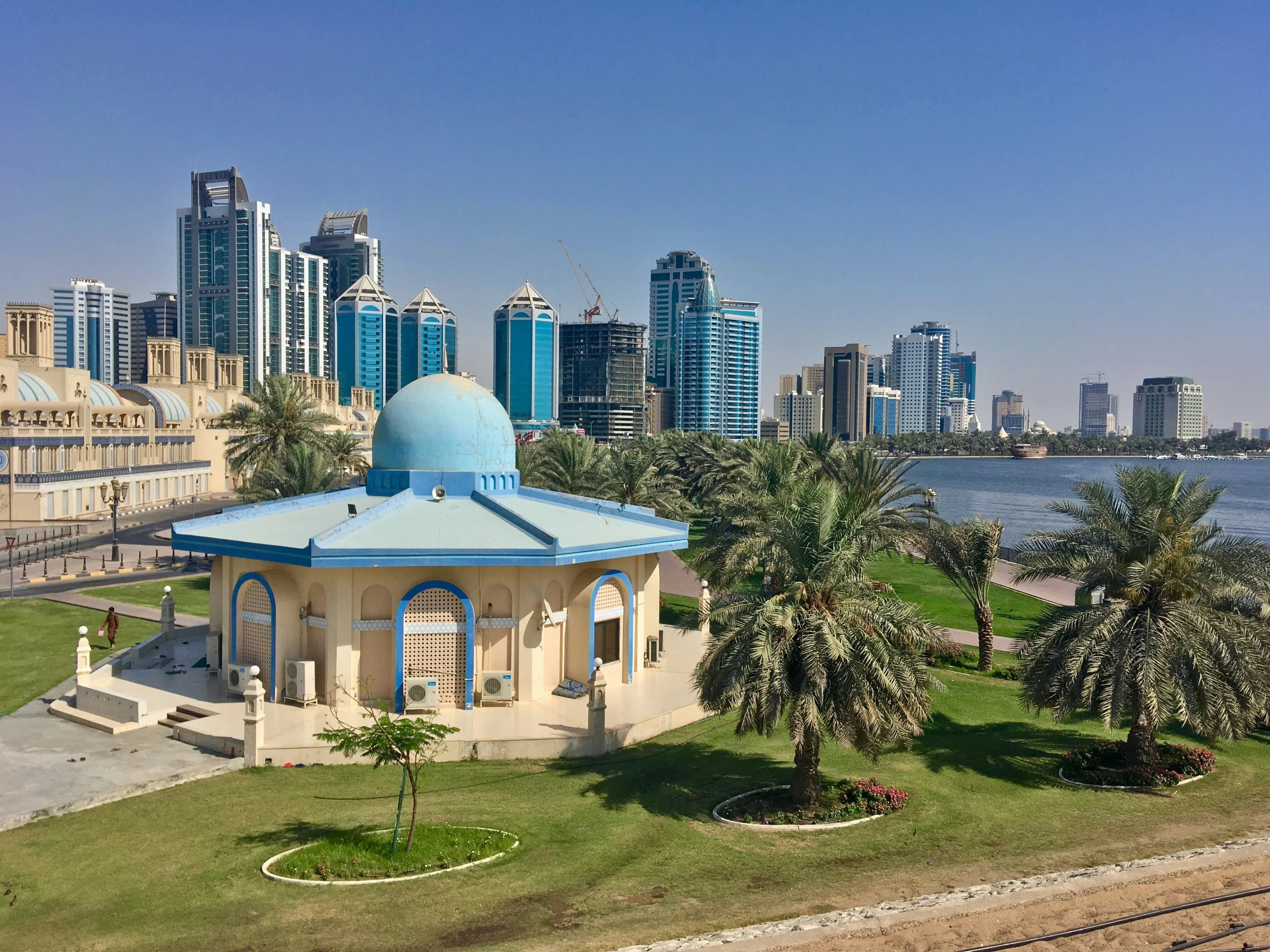 Sharjah city skyline with cultural landmarks and waterfront