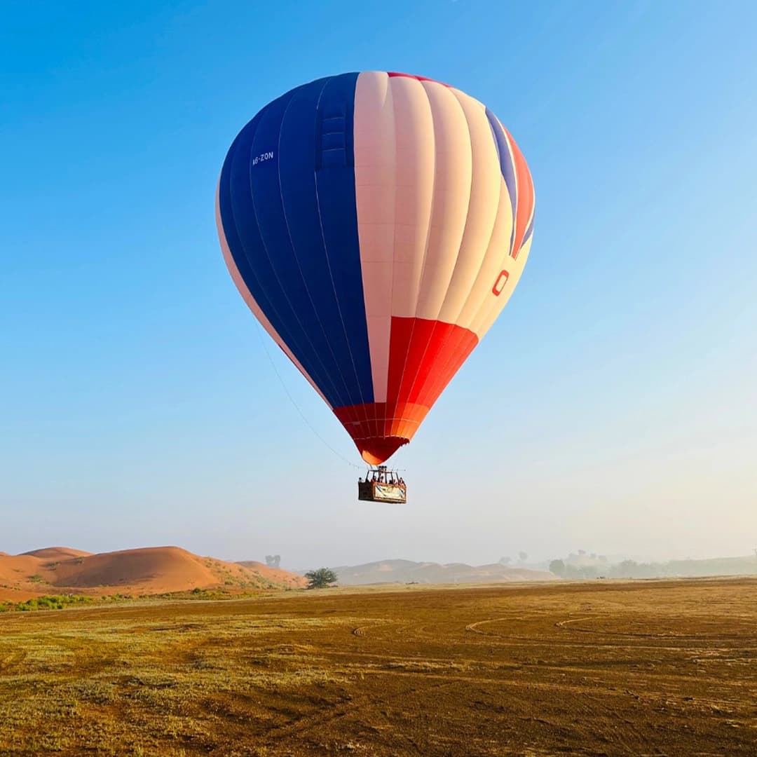 Ras Al Khaimah desert landscape with sand dunes and off-road adventure activities