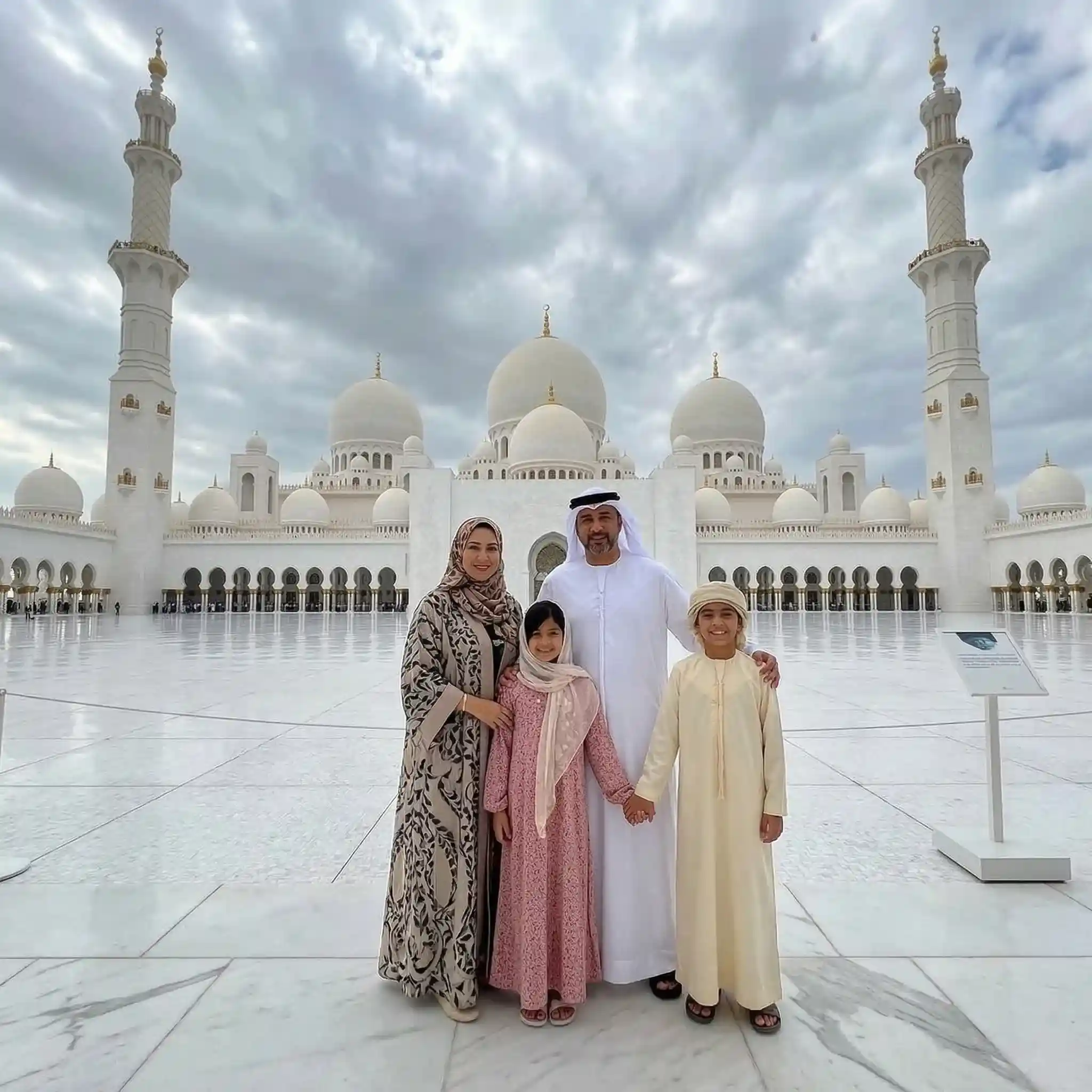 Sheikh Zayed Grand Mosque Abu Dhabi with white marble domes and reflective pools at sunset