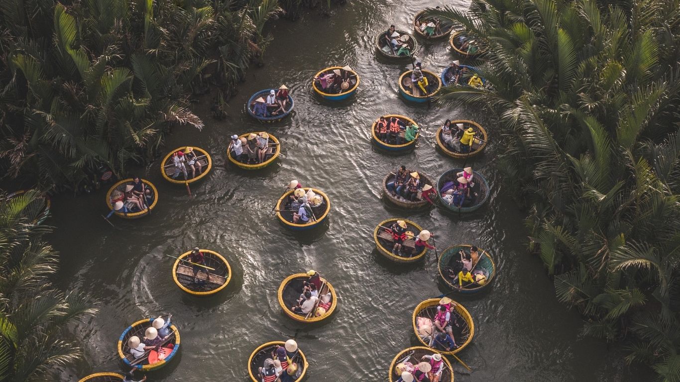 Vietnam travel package featuring Danang, Hoi An lantern streets, Golden Bridge, tropical island experiences, and Phu Quoc attractions