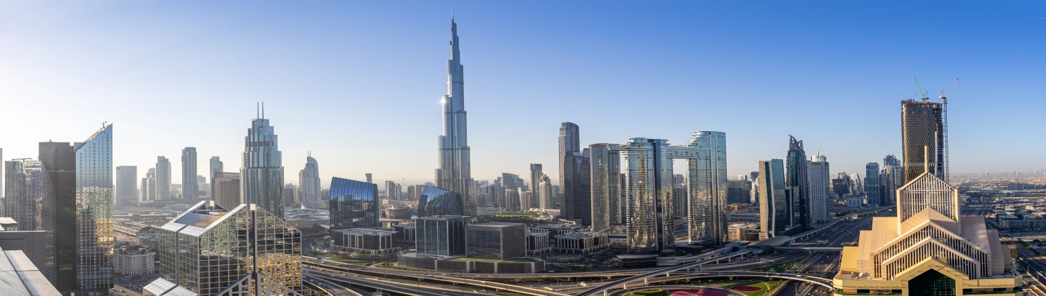Travel agents promoting UAE tours with scenic destinations, beaches, and cultural experiences
